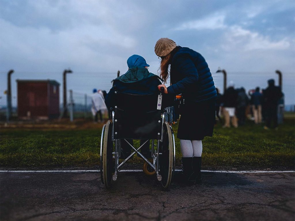 resident on a walk with carer