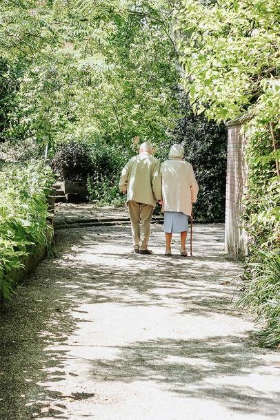 Couple walking along path