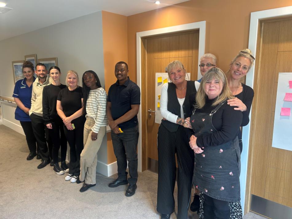 the staff standing at the snelling floor