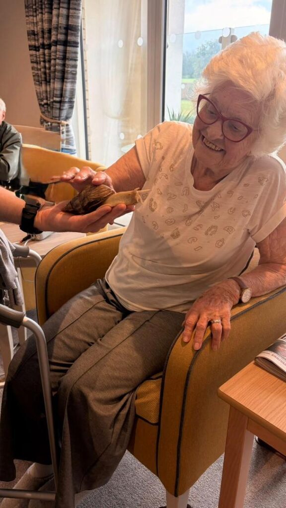 zoo lab man with snail and resident