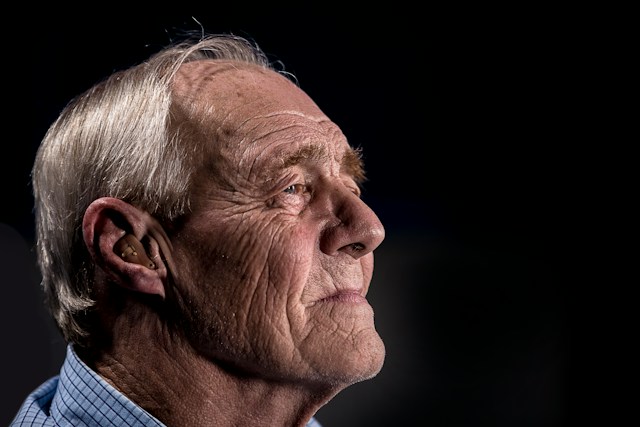 portrait of man on black background